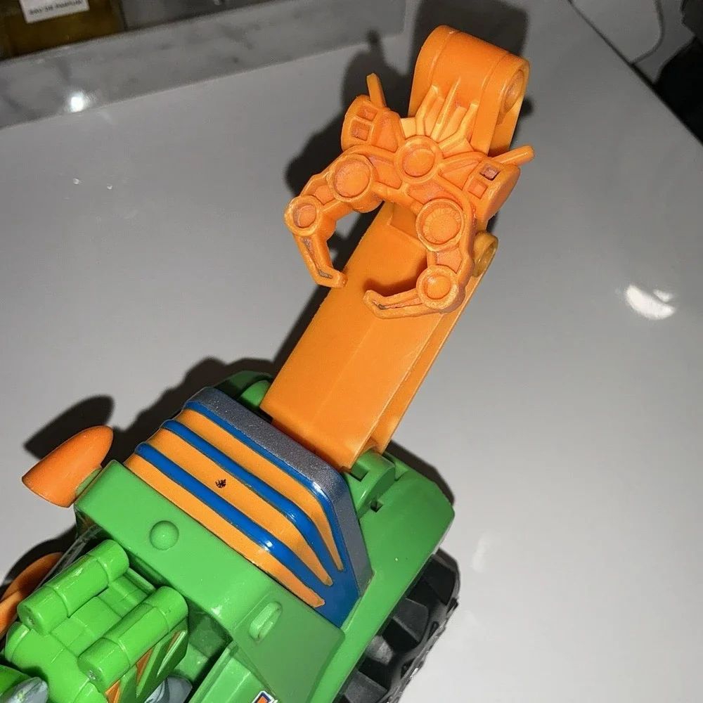 Paw Patrol Rocky Rev Up Deluxe Dino Rescue Vehicle with Dinosaur & Figure